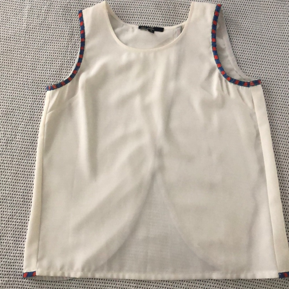 Sleeveless blouse with orange and blue detail